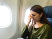Feeling tired, bloated, and puffy after flying? Here's why.